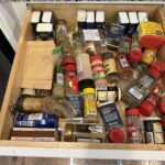 An open spice drawer, a simple way to organize kitchen with AI