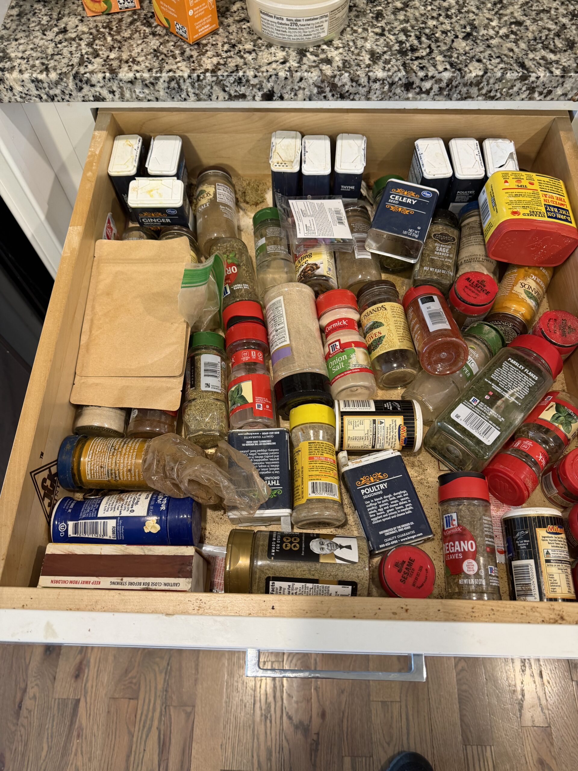 An open spice drawer, a simple way to organize kitchen with AI