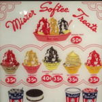 Vintage Mister Softee board used to check ice cream cone cost then and now